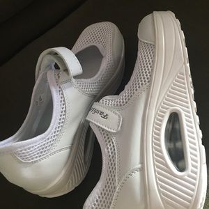 Brand new walking shoes; size 38, white.